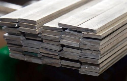 Steel flat bars stacked for industrial use – CoreMet Steel structural and fabrication material
