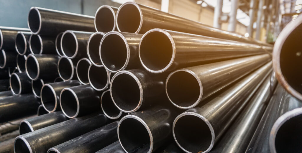 Structural steel ERW tubes stacked in warehouse for construction and engineering supply